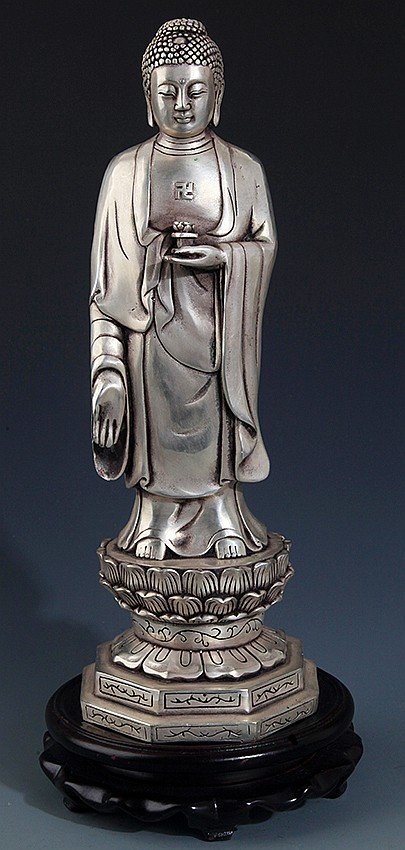 A SILVER PLATED SHAKYAMUNI BUDDHA STATUE. J015. (1 of 10)
