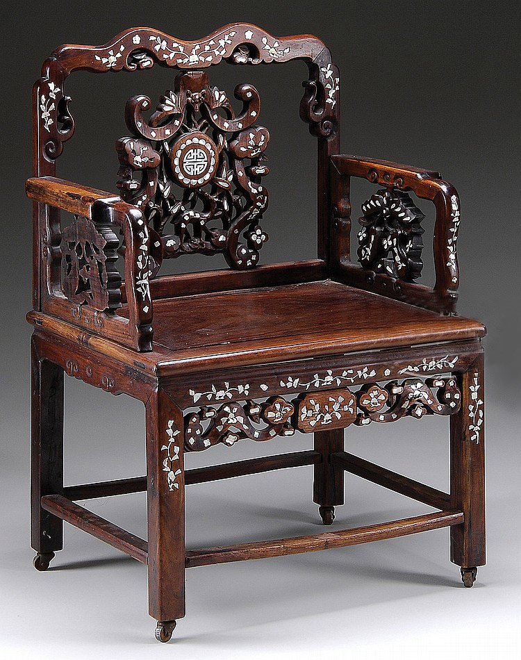 FINE ELABORATE ROSEWOOD CARVED CHINESE MOTHER-OF-PEARL: FINE ELABORATE ROSEWOOD CARVED CHINESE MOTHER-OF-PEARL ARMCHAIR.M015. China.Late 19th century.The undulating crestrail above a large pierced splat carved with ruyi scepters centering an inlaid rondel 