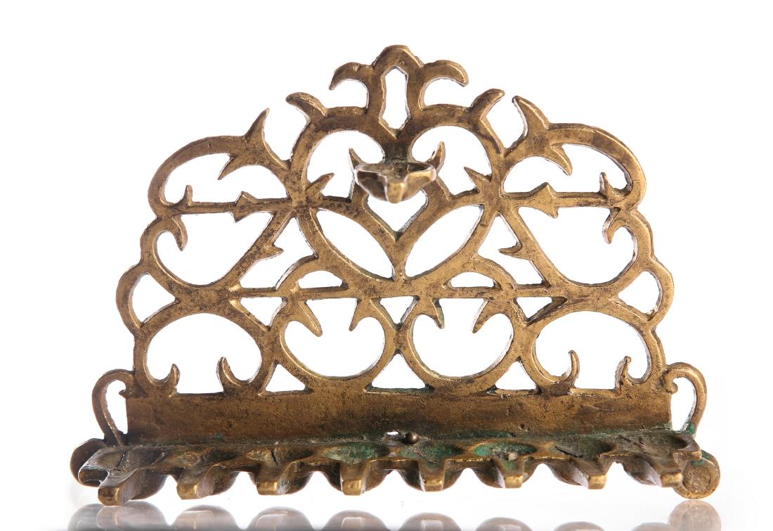 Chanukah Menorah - Italy, 19th Century: Chanukah menorah, cast brass - Italy, 19th century. Wall made of thin branches with openings between them and a sun hanging in the center. For a similar menorah, see The Stieglitz Collection: Masterpi