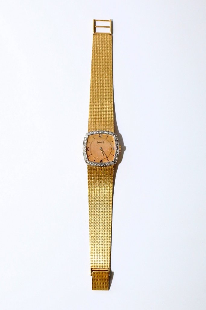 Piaget Woman's Watch with Gold Band. 18K. Set with (1 of 3)