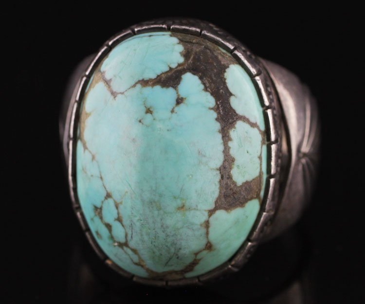 Native American Style Ster. & Turquoise Ring: Native American style sterling silver and turquoise mens ring. Marked DV. 14.9 grams. Stone 17.98 X 24.70mm. Est. $450-$700