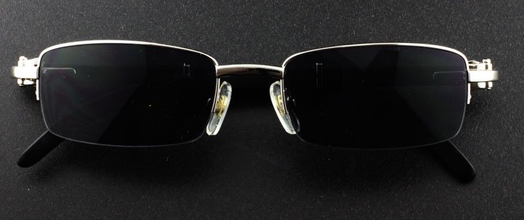 Cartier Mens Sunglasses Style 140 6189865: Est 500-1000 Cartier mens sunglasses 6189865. Stainless and black wood frames. Estate piece. Good condition