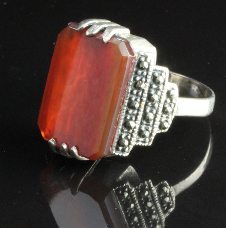 Vintage Sterling silver Ring: Est. $50-$125 Vintage sterling silver ring with chalcedony & marcasite. Sterling 6.3grams. Main stone Chalcedony rectangular cut. 16.5 X 11.8mm accented with marcasite. Estate piece. Condition good.