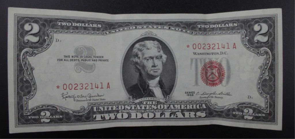 1963 Star $2 Dollar Bill, Red Seal: Est $150-$250 1963 star Two dollar bill. Red seal. Good condition. Still crisp. Two non-creased folds. Serial Number *00232141A