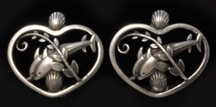 Pair of George Jensen Silver No. 101 Earrings: Est $ 10 - 15 Pair of Georg Jensen Silver No. 101 Earrings • made by Georg Jensen of Copenhagen, Denmark and was designed by Arno Malinowski (1899-1976) circa 1933-1944 • bears the marks: GJ (in r