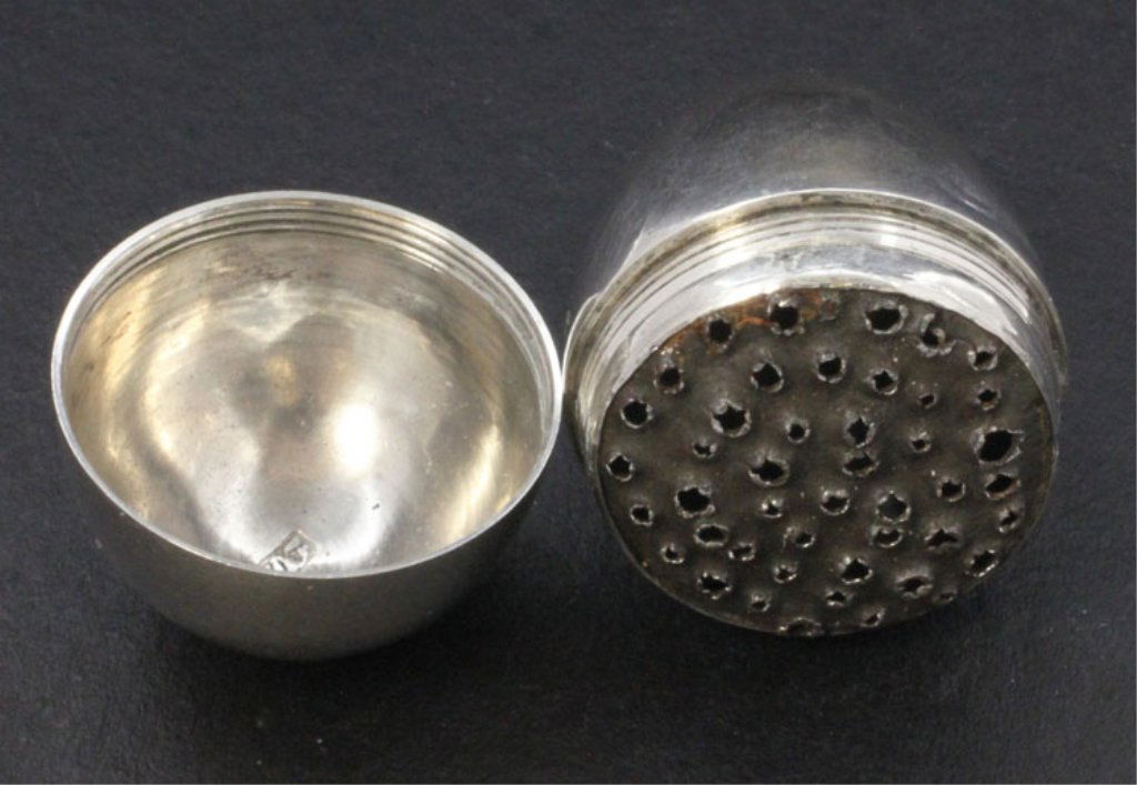 Continental Silver Egg-form Nutmeg Grater: Est $ 10 - 15 Continental Silver Egg-form Nutmeg Grater • possibly Dutch made circa 1890 • bears the marks: (partial effaced) • 1 1/4" in height and weighs 0.305 gross ounces • the egg shaped