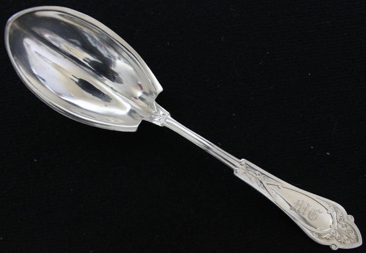 Wood & Hughes Silver Venetian Serving Spoon: Est $ 30 - 50 Wood & Hughes Silver Venetian Serving Spoon • made by Wood & Hughes of New York, NY and was designed in 1875 • bears the marks: W&H, STERLING, WM SAVAGE • 6 1/2" in length and weig
