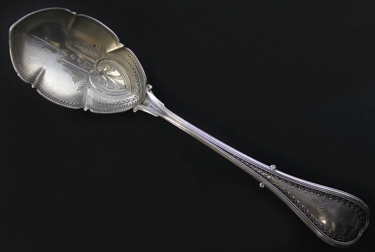 Wood & Hughes Coin Silver and Gilt Serving Spoon: Est $ 30 - 50 Wood & Hughes Coin Silver and Gilt Serving Spoon • made by Wood & Hughes of New York, NY circa 1860 • bears the marks: W&H, J WALKER • 6 7/8" in length and weighs 1.0 troy ounces �