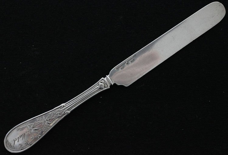 Tiffany Silver Japanese Luncheon Knife: Est $ 40 - 60 Tiffany Silver Japanese Luncheon Knife • made by Tiffany & Co. of New York, NY and was designed in 1871 • bears the marks: TIFFANY & CO, STERLING, PAT 1871, M • 7 3/8" in length an