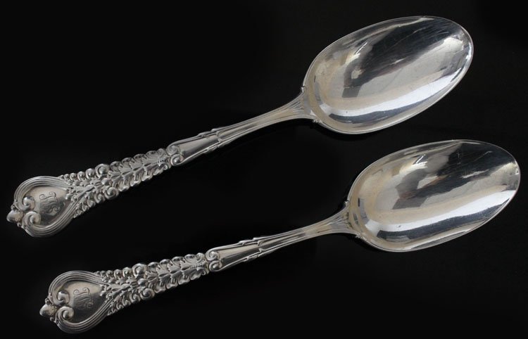 2 Tiffany & Co Silver Florentine Serving Spoons: Est $ 150 - 250 2 Tiffany & Co Silver Florentine Serving Spoons • made by Tiffany & Co of New York, NY and was designed in 1900 • bears the marks: TIFFANY & CO, STERLING, PAT 1900, M • 8 1/2" in