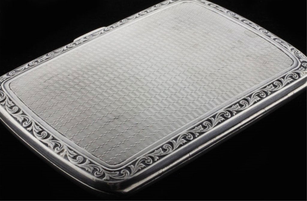 Matthews Geo V Silver & Gilt Cigarette Case: Est $ 70 - 100 Matthews Geo V Silver & Gilt Cigarette Case • made by Henry Matthews of Birmingham, England in 1928-1929 • bears the marks: (lion passant), (anchor), HM, D • 3 1/2" in length and