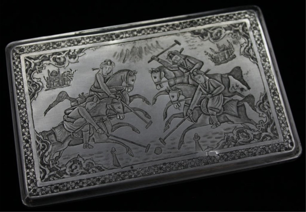 Persian Silver Cigarette Case: Est $ 150 - 250 Persian Silver Cigarette Case • made circa 1940 • bears purity and city marks: in Farsi • 5" in length and weighs 5.33 troy ounces • inscribed to the interior Desert Carnival, 