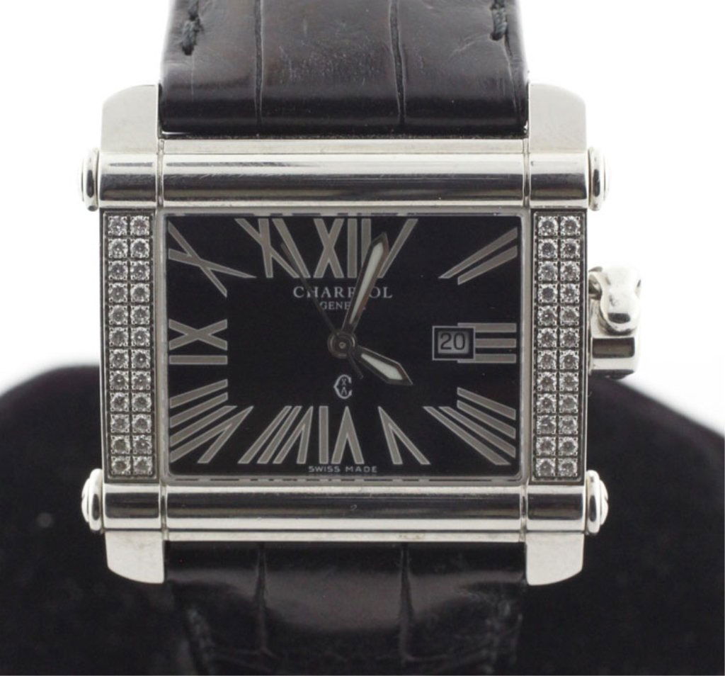 Philippe Charriol Stainless & Diamond Watch: Est. $900-$1500 Philippe Charriol stainless & diamond fashion watch. Diamonds .50ct tw VS-SI colorless. Hand made alligator band. CCHL 02607. Condition very good. Still has protective plastic over cas