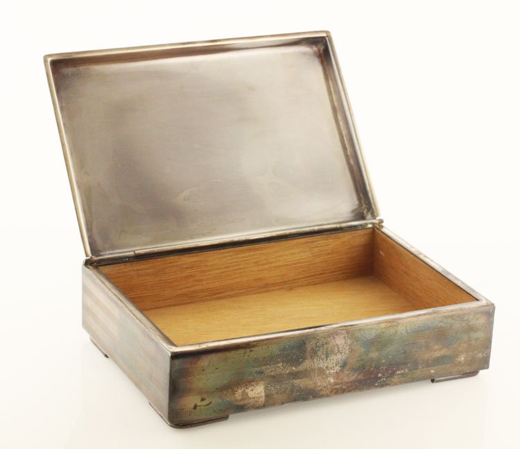 Vintage Cedar Lined Silver Plated Cigarette Box: Est. $100 - 150 Vintage Cedar Lined Silver Plated Cigarette Box Desk top style silver plated cigarette box. Cedar lined. 5 3/8 X 3 1/2 X 1 1/2 inch. No marks. Good condition.