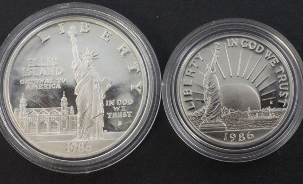 1986 Ellis Island $1 & Nation of Immigrants Coin: Est. $40 - 75 1986 Ellis Island $1 & Nation of Immigrants .50 Coins. This lot has the 1986 $1 Ellis Island Silver Dollar and 1986 .50cent nation of Immigrants coin set. Original box and papers not inc