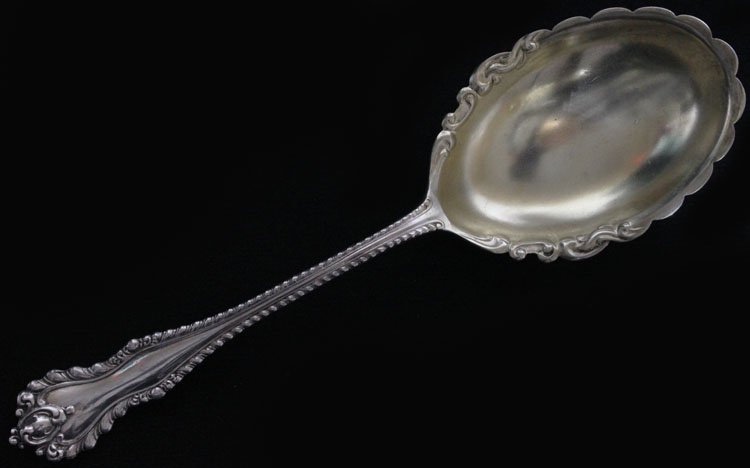 Dominick & Haff Silver Mazarin Casserole Spoon: Est $ 80-120 Dominick & Haff Silver Mazarin Casserole Spoon made by Dominick & Haff of New York, NY and was designed in 1892 bears the marks: (rectangle-circle-diamond), STERLING, PATD 92 9" in length