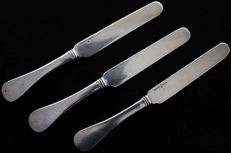 3 Tiffany Silver Antique Pattern Luncheon Knives: Est $ 150 - 250 3 Tiffany Silver Antique Pattern Luncheon Knives • made by Tiffany & Co. of New York, NY and was designed in 1870 • bears the marks: TIFFANY & CO, STERLING, M • 7 3/4" in length 