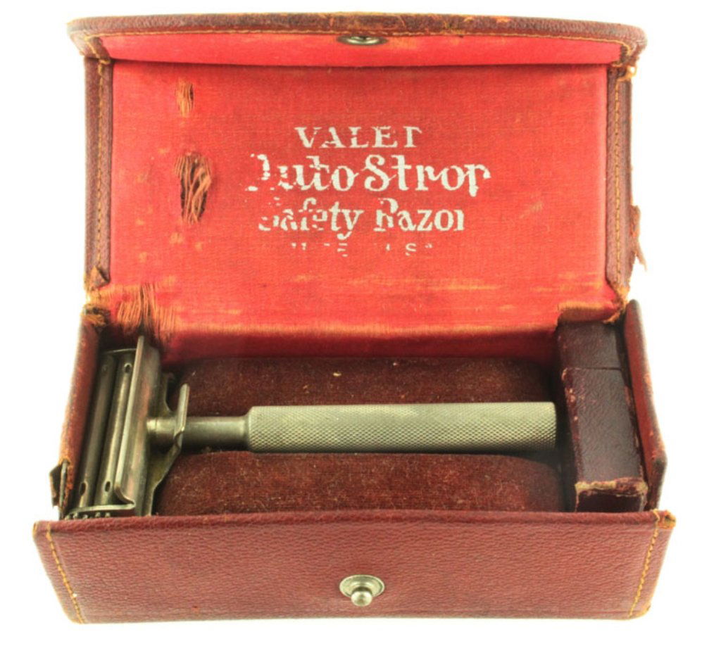 Valet Auto-Strop Safety Razor: Est. $30 - 45 Valet Auto-Strop Safety Razor. Comes with strop, vintage box, blade case with blades and razor. Box shows wear on edges and corners. Also on high points of inside padding. Snap button st