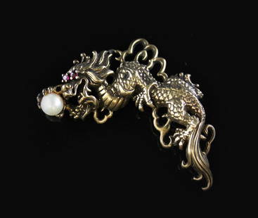 Vintage Franklin Mint Dragon Brooch: Est. $ 30-45 Vintage Franklin Mint Dragon Brooch Franklin Mint dragon brooch from 1987, vintage sterling vermeil dragon, ruby chips for eyes and holding a 7mm pearl in it's claw. Signed 'FM', mark