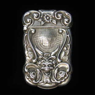 American Silver Match Safe: Est. $ 75 - 125 American Silver Match Safe Demon face on both sides. Inscribed M.E. to J.J.M. Marking Sterling. Measures 2.5" tall and 1.5" wide. Weighs .605 ozt. Good condition