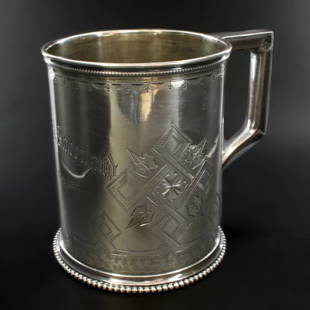 Gorham Sterling Mug: Est. $ 130 - 200 Gorham Sterling Mug Monogrammed Louisa A Sweetland June 21st 1871. Beaded ring and base. Angular handle. Marked Lion, Anchor, G, Sterling, 53, B. Measures 3" tall by 2.5" wide.