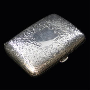 Vintage Sterling Cigarette Case: Est. $ 90-135 Vintage Sterling Cigarette Case Pledge and Son Cigarette Case, Marked with the P&S, with the Birmingham Anchor and Lion, with the A marking this case made in 1900. The case weighs 3.06