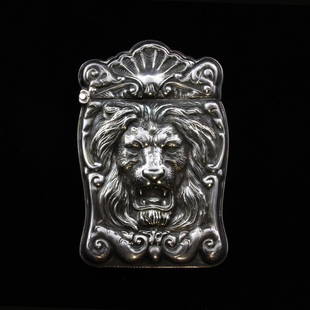 Sterling 1900 Lion Vesta Case: Est. $ 20 - 30 Sterling 1900 Vesta Case Monogrammed GW 1900 and Lion design on the front 2 1/2" long x 1 1/2" wide, weighs .9 troy oz