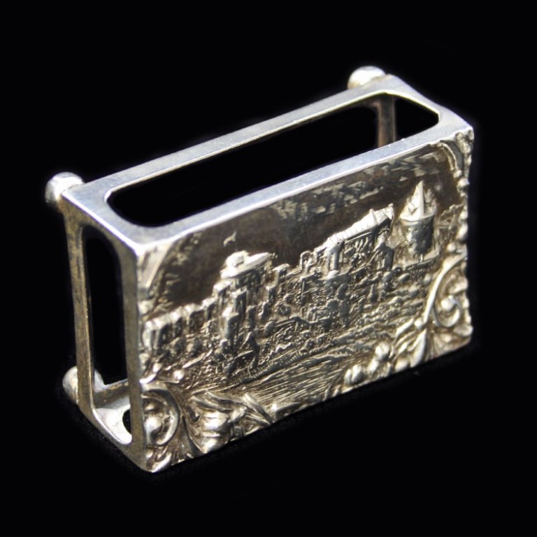 Crisford and Norris Repousse Matchbox Holder: Est. $ 40 - 65 Crisford and Norris Repousse Matchbox Holder Royal Windsor scene on top. Marked C&N, Anchor, Lion, d. Made in 1903. Measures 2.5" x 1.5" x 1". Weighs .590.