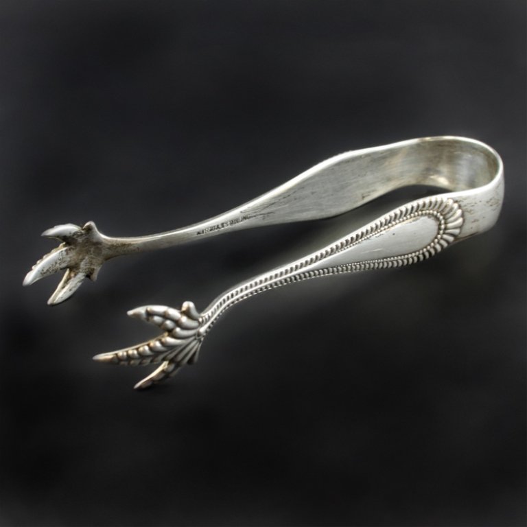 RW&S Wallace Silver Tongs: Est. $ 15-25 RW&S Wallace Silver Tongs Marked sterling 3 1/2" long weighs .69 troy oz