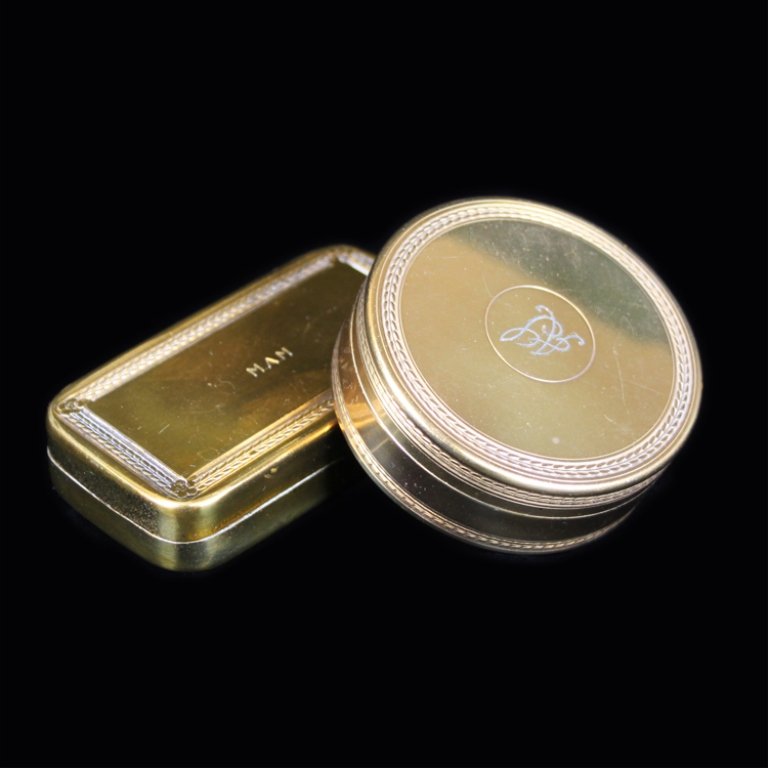 Two R. Miracoli & Co. Small Pill Boxes: Est. $ 15-25 Two R. Miracoli & Co. Small Pill Boxes Small circle pill box monogrammed AJ and rectangular pill box marked M.A.M. Bears the Miracoli mark and made of mixed metals. Rectangle is 3" x 1 1/
