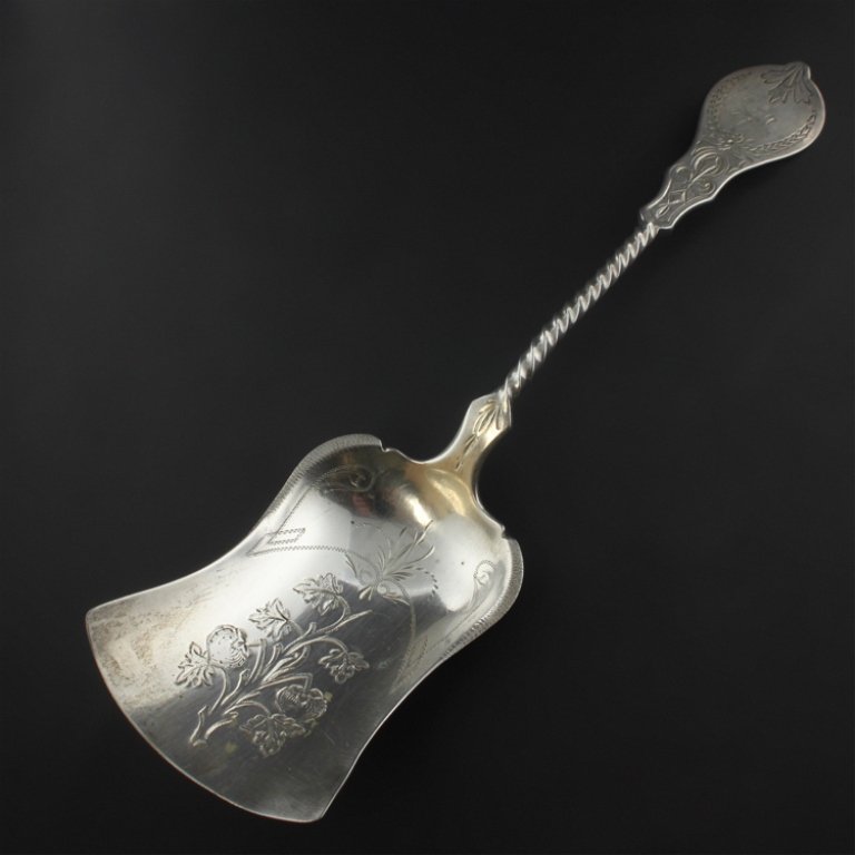 Charles C. Shaver Sugar Shovel: Est. $ 34 - 50 Charles C. Shaver Sugar Shovel Hand Etched Sugar Shovel, monogrammed, 9" long and weighs 1.70 troy oz