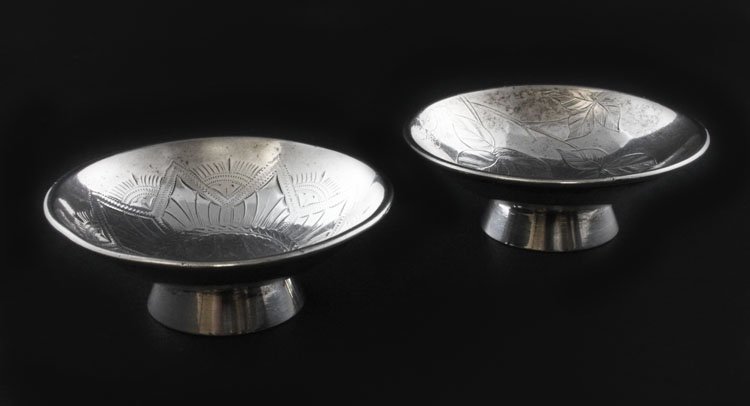 Two Vintage Sterling Gorham Sterling Nut Cups: Est. $ 70-105 Two Vintage Sterling Gorham Sterling Nut Cups Marked with the Gorham symbols, sterling,1520 and O. Made in 1882, Hand engraved oriental floral pattern and 8 pointed star patterned. 2 1/2