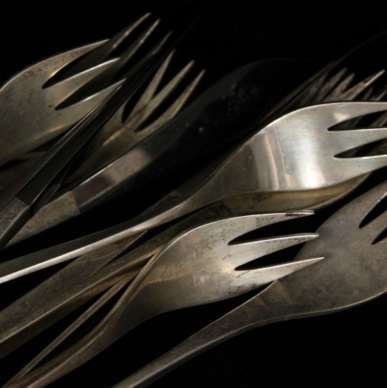 Ronald Pearson "Vision" Flatware: Est. $ 750-1100 Ronald Pearson "Vision" Flatware. This lot includes (4) each dinner forks, salad forks and knives. 20.38 troy oz. total weight. 1960's modernist design