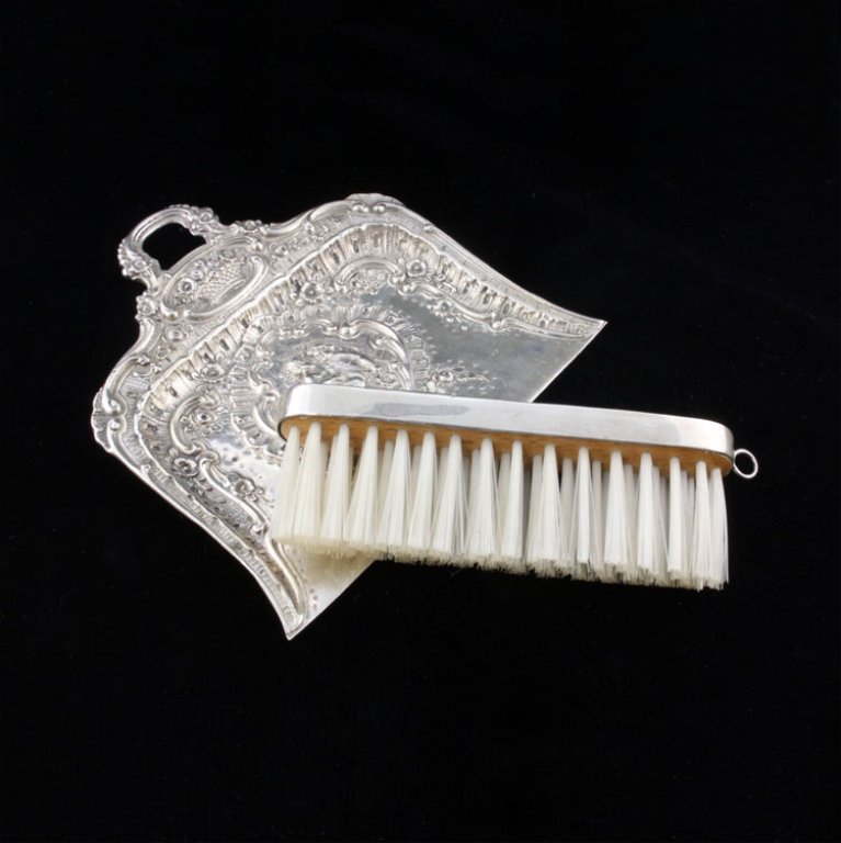 Butlers Crumb Tray Catcher & Brush: Est. $ 60 - 90 Butlers Crumb Tray Catcher & Brush. Sterling tray and brush both bear the Germany makers mark. Brush has a repousse floral and star geometric design 4" long x 1/2" wide x 1 1/3" tall, s