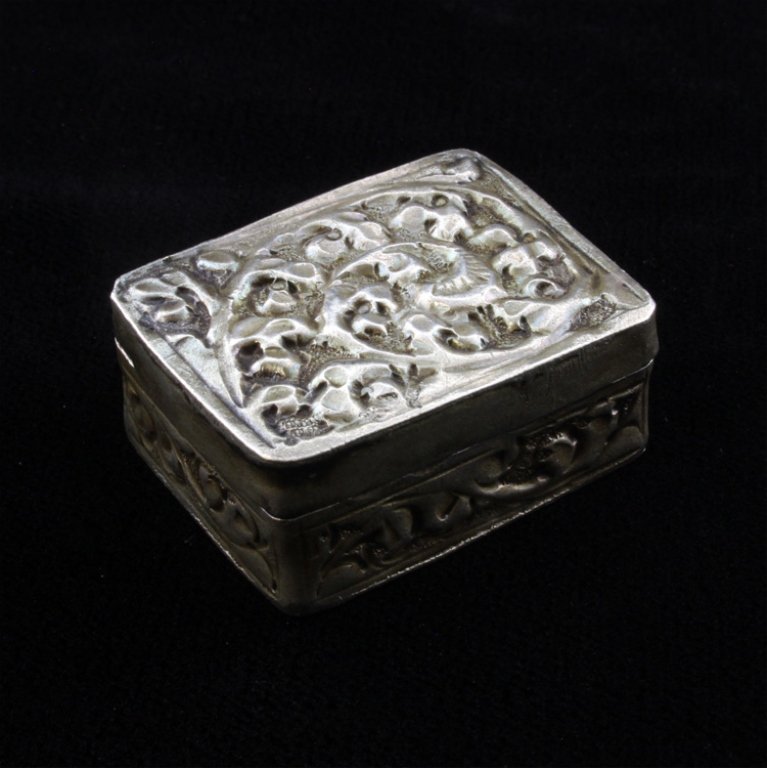 Silver Repousse Pill Box: Est $ 15-30 Possibly sterling floral repousse pill box with no observed maker marks. 1 1/4" long x 1" wide and 4/8" tall and weighs .40 ozt
