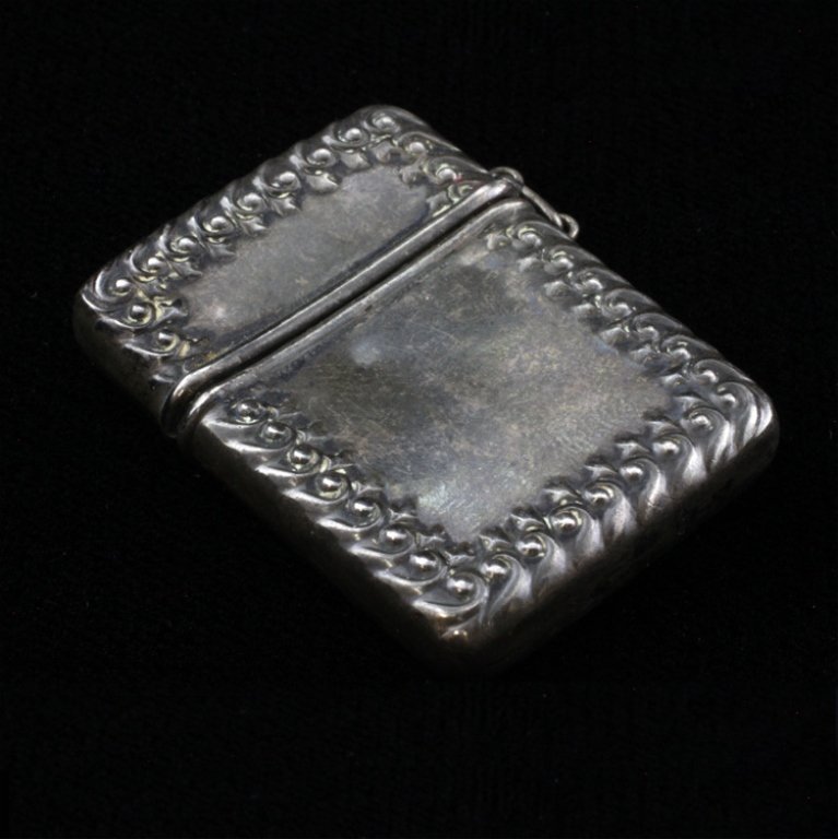 H.H. Curtis & Co. Vesta Case: Est $ 20-45 Sterling marked Vesta Case monogrammed KAD with a geometric designed border. Inside the case bears the H.H. Curtis & Co. makers mark. and measures 1 1/2" long x 1 1/8" wide and weighs .22 