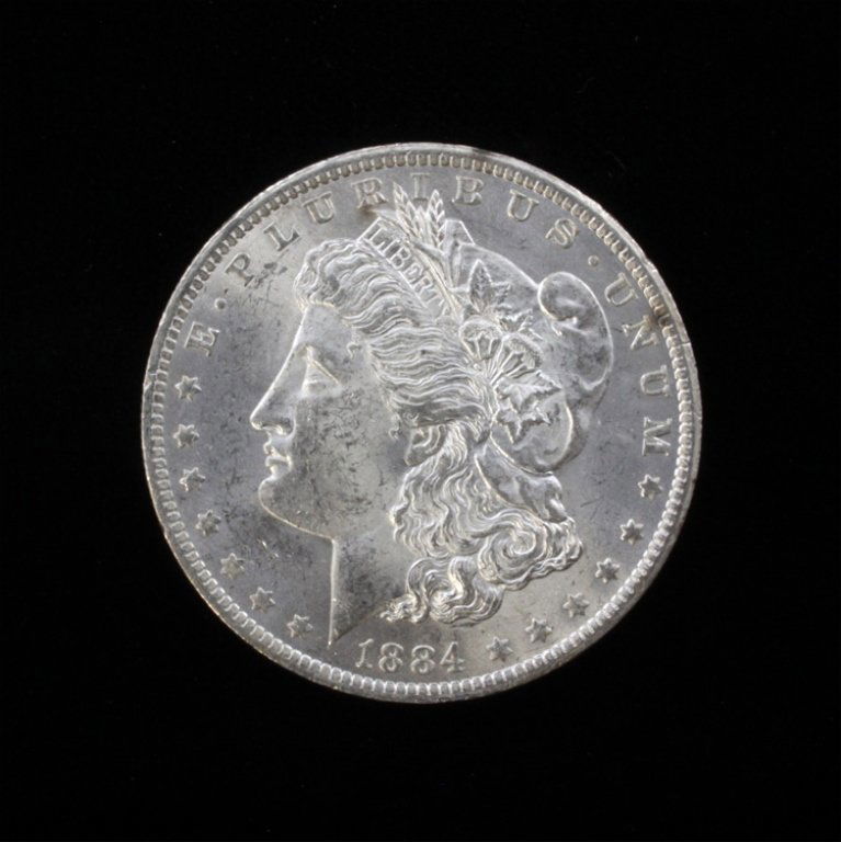 1884 O Morgan Silver Dollar $1: Est. $ 50 - 75. 1884 O Morgan Silver Dollar $1. Uncirculated. Good condition.
