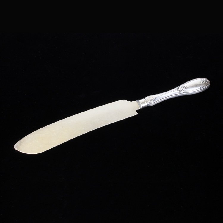 Bailey and Co. Cake Knife: Est $ 100-150 Silver cake knife with a grapevine bright cut etched pattern on the blade and is marked Bailey & Co Patent 1846. The handle bears the personal monogram of what appears to be a J and has