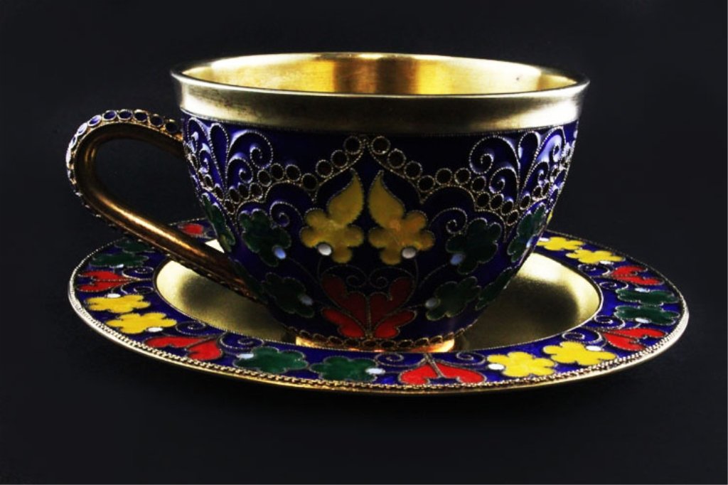 Russian Silver Gilt & Cloisonne Tea Cup & Saucer: Est. $ 600-1100 Russian Silver Gilt & Cloisonne Enamel Tea Cup & Saucer. Cup is 2 inches tall, saucer is 4 1/4 inch diameter. Marked with Russian hammer and sickle in star, 916 and unknown mark. Weigh