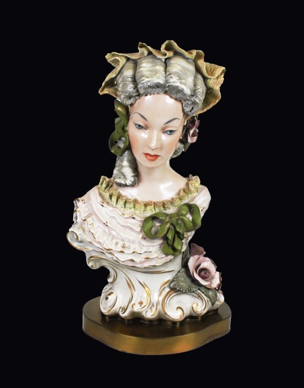 Large Cordey Ceramic Bust: Est. $ 100 - 200 Large Cordey Ceramic Bust. Wonderful example of Cordey ceramic. Highly detailed lady with lacey ribbon and flower. Condition issues include minor loss to lace. Metal base. 16 1/2 tall