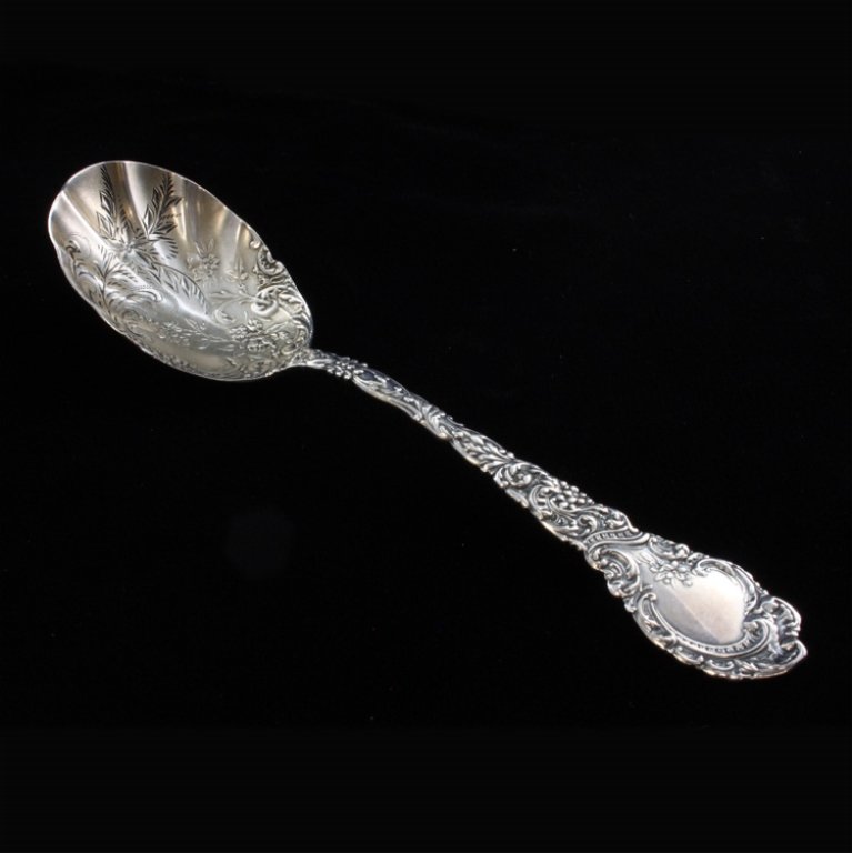 Wallace Silversmiths Louvre Sterling Spoon: Est $ 80-130 Sterling spoon made by Wallace Silvermiths with the1893 Louvre pattern designed by William H. Tomey. The reverse transition of the handle is marked R. Wallace & Son Mfg. Co. makers mark a