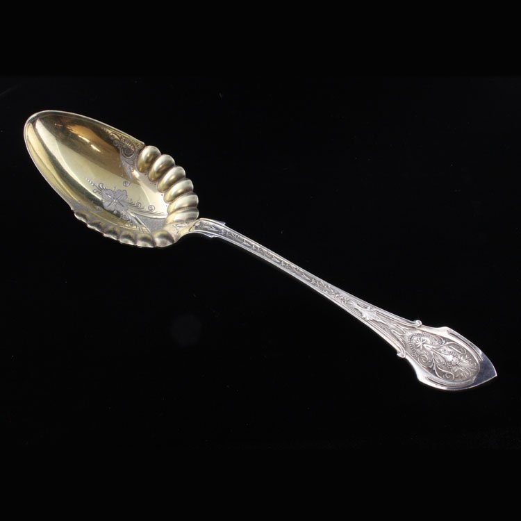 Wood & Hughes Angelo Serving Spoon: Est $ 90-130 Sterling and gilt bright etched serving spoon made by Wood & Hughes with the1875 Angelo pattern designed by Charles F. Richers. The serving spoon measures 8" long x 2" at the widest point