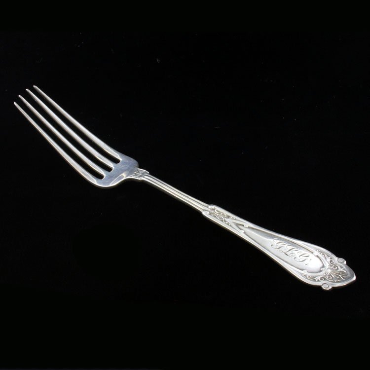 Wood & Hughes Venetian Fork: Est $ 60-100 Sterling fork made by Wood & Hughes with the 1875 Venetian pattern designed by Charles F. Richers. The fork measures 6 3/8" long x 7/8" at the widest point and weighs .86 ozt.
