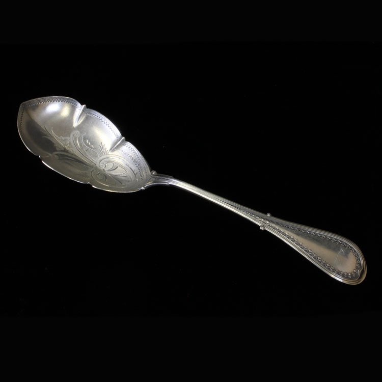 Wood & Hughes Cellini Sterling Berry Spoon: Est $ 80-160 Sterling bright cut berry spoon made by Wood and Hughes with the1875 Cellini pattern engraved Lulu on the handle. The spoon measures 9" long x 2 1/8" long and weighs 2.0 ozt.