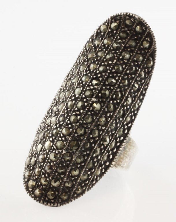 Vintage Style Sterling Fashion Ring with Marcasite: Est. $45 - 75 Vintage Style Sterling Fashion Ring with Marcasite. Ring weighs approx. 11.90 grams. Elongated turtle shell shape design accented with marcasite. Ring is 1 5/8 inches at widest point.