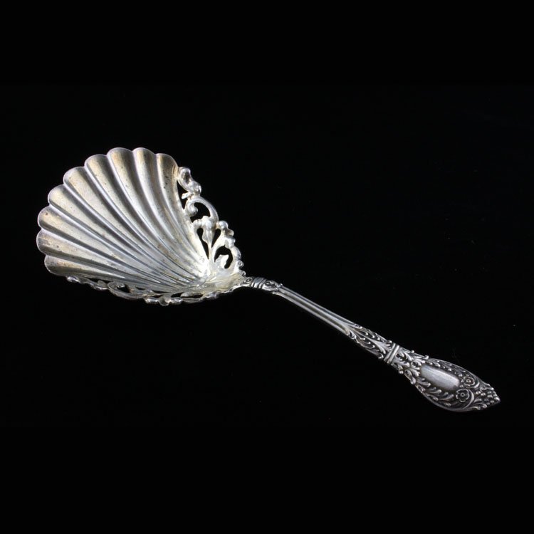 Sterling J.B. & S.M. Knowles Roman: Est $ 60-100 Sterling bon bon spoon made by J.B. & S.M. Knowles with the1900 Roman pattern designed by Louis R. Horton. The reverse of the handle is marked 54, sterling, Pat. and bears the animal make