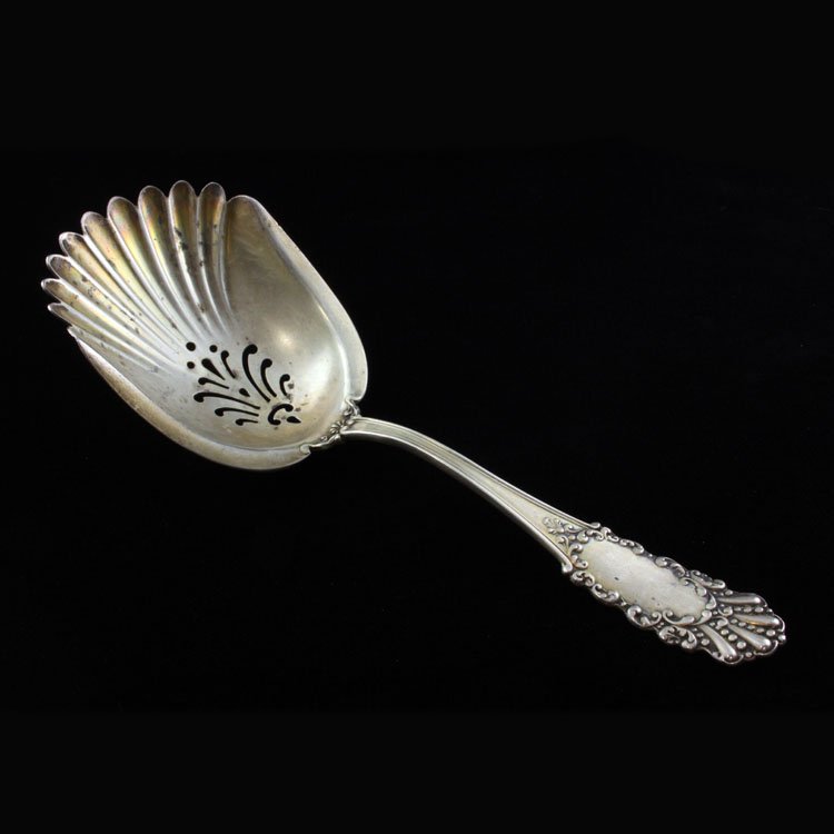 The Watson Co. Coronado Bon Bon Spoon: Est $ 80-120 Sterling bon bon spoon made by The Watson Co. with the1940 Coronado pattern. The spoon has a pierced bowl and the reverse is marked sterling and bears The Watson Co. makers mark. The spoo