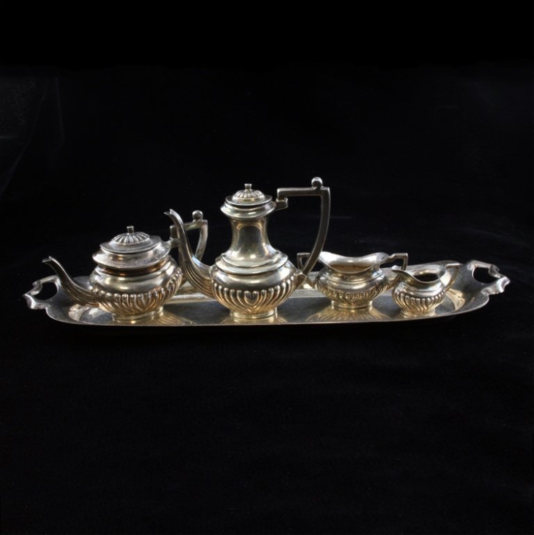 John Rose Queen Anne Edwardian Mini Tea Set: Est $ 200-300 Sterling miniature tea set and tray from Birmingham, England marked by John Rose with a 1917 S date mark. The set includes coffee pot 1 1/2" tall, a tea pot 1" tall, a creamer 1/2" tall