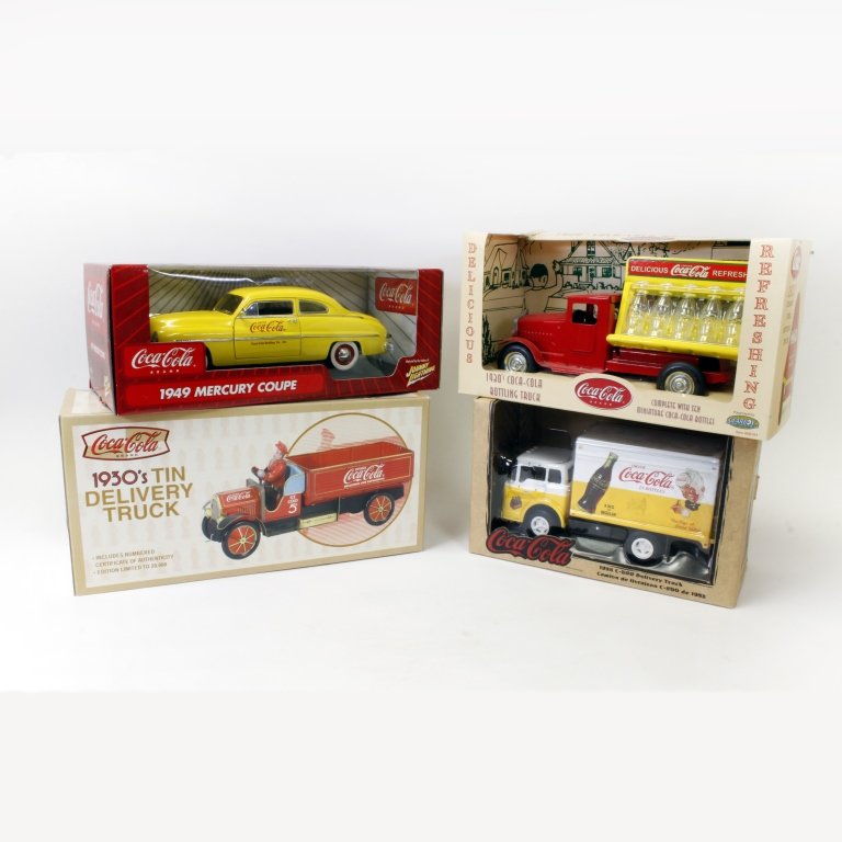Set of Four Coca-Cola Collectable Vehicles: Est $ 600-800 Set of Four Coca-Cola Collectable Vehicles including: a 1958 c-800 delivery truck, the box has small damage. A 19030's Coca-Cola bottle truck, the box has a rip that has been taped. A 19