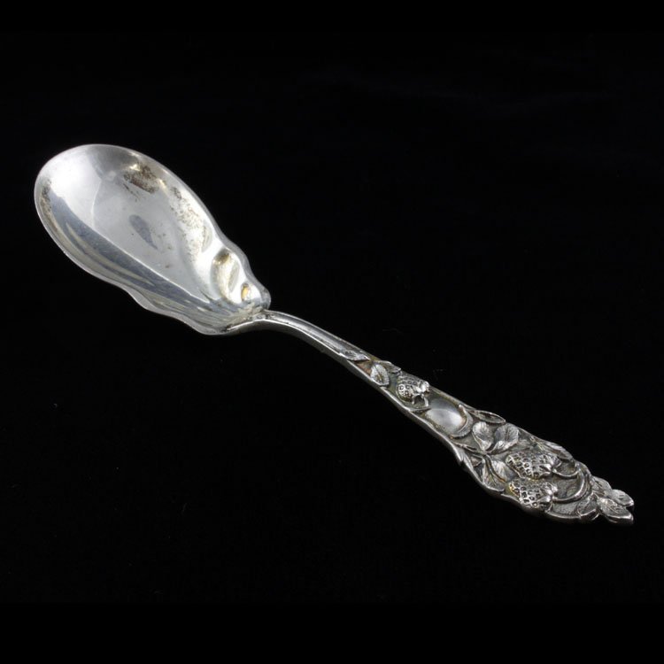 Sterling Watson Fruit Series Jelly Spoon: Est $ 50-90 Sterling jelly spoon made by Watson with the 1903 Fruit Series No.1 Strawberry pattern designed by Eustace Crees and Charles S. Court. The spoon measures 4 1/4" long x 1" at the widest poi